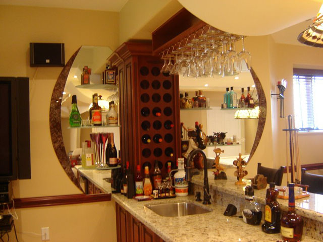 Marbleized bar mirrors with glass shelves