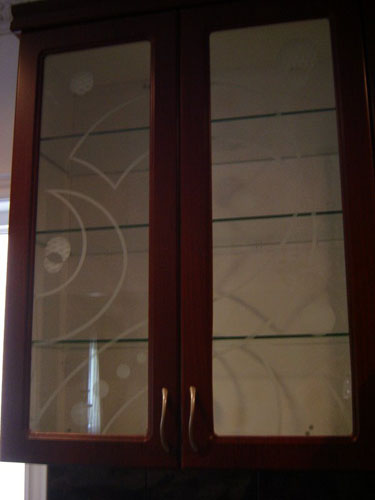 Artistic glass on kitchen cabinets
