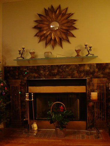 Marbleized glass fireplace covering with glass shelf