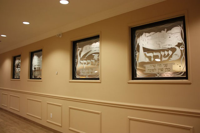 Interior windows with Bible-themed designs