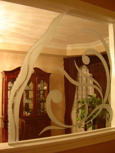 Etched design on non-privacy dining room partition